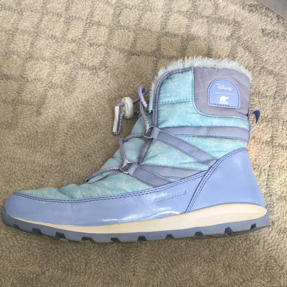 Blue Disney/Sorel snow boots with snowflakes